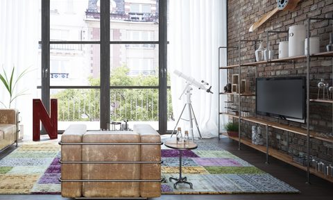 rustic and industrial living room with metal and wood tv console