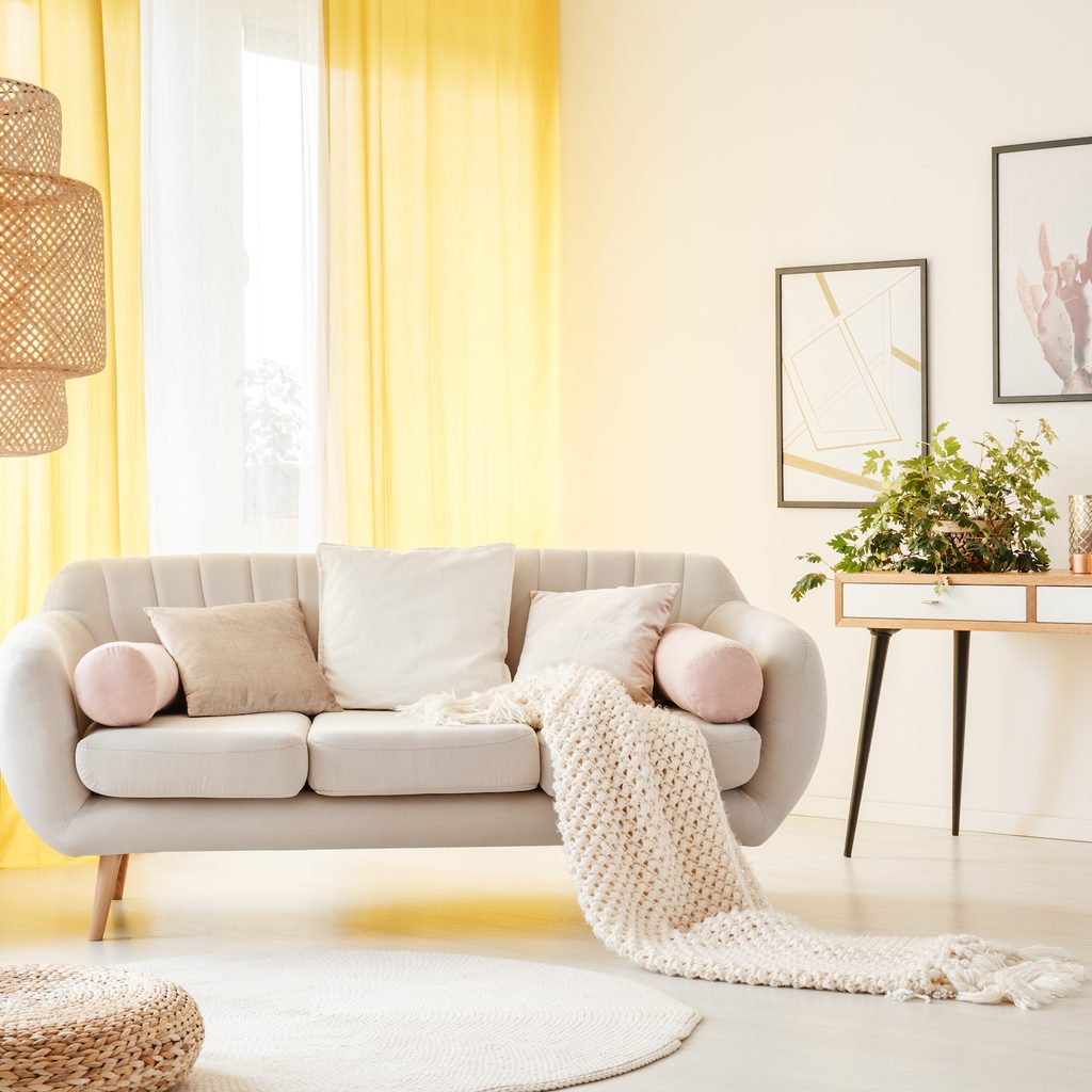 Living room with yellow curtains.