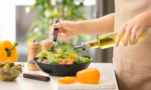 mediterranean diet recipes woman making healthy salad