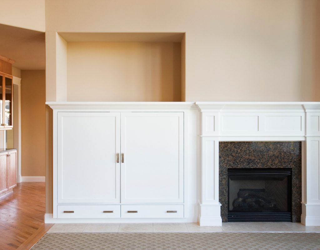Painted beige wall with fireplace in living room