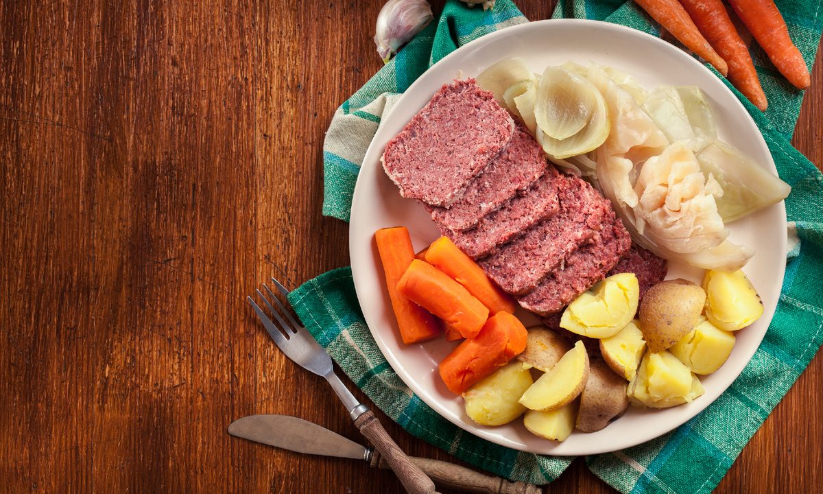 Plate of corned beef and cabbage on a table