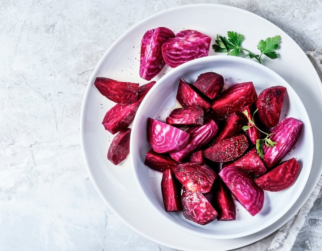 cut beetroot chunks in a white dish