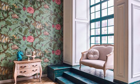 Grandmillenial inspired floral wallpaper with cabinet and chair