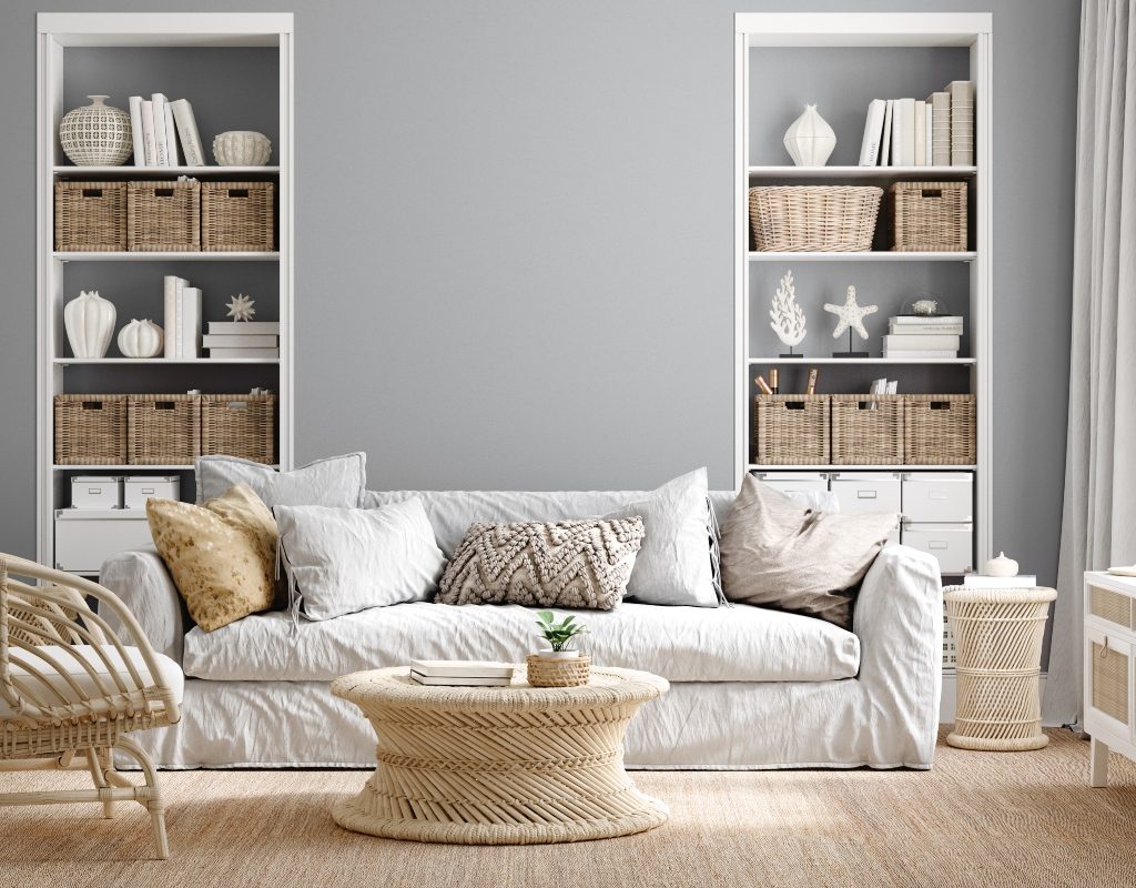 grey modern coastal living room design with bookshelves