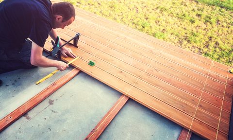 Man building a deck.