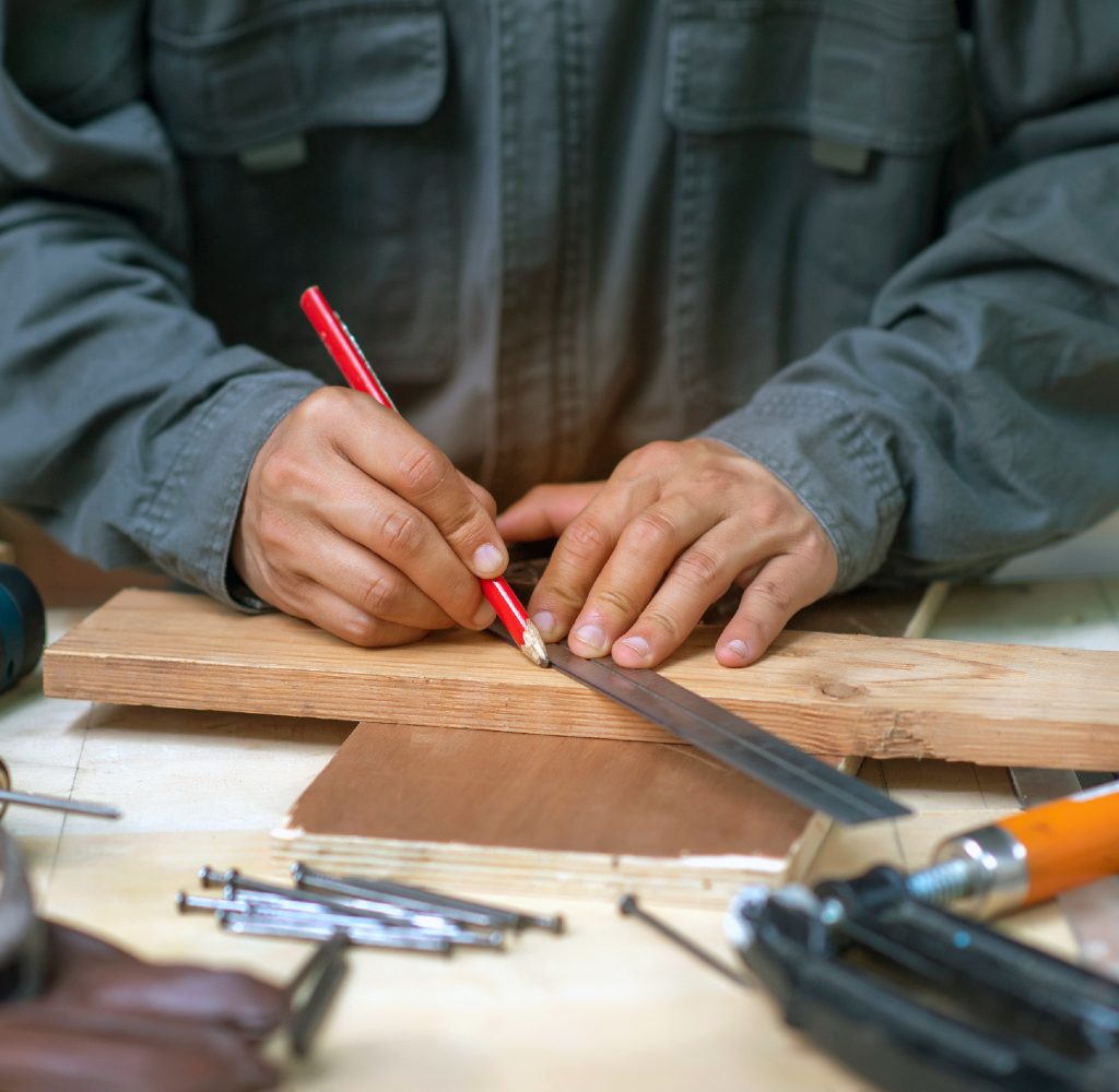Man building a deck.