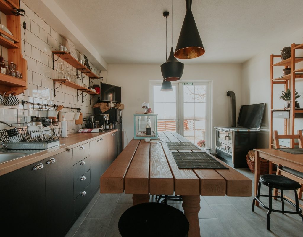 modern rustic kitchen with table center island