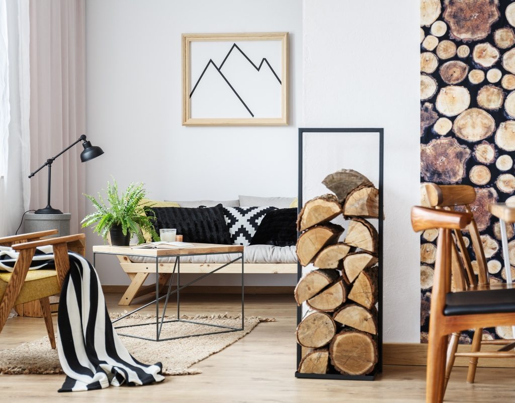 modern rustic living space with wood stack and modern furniture
