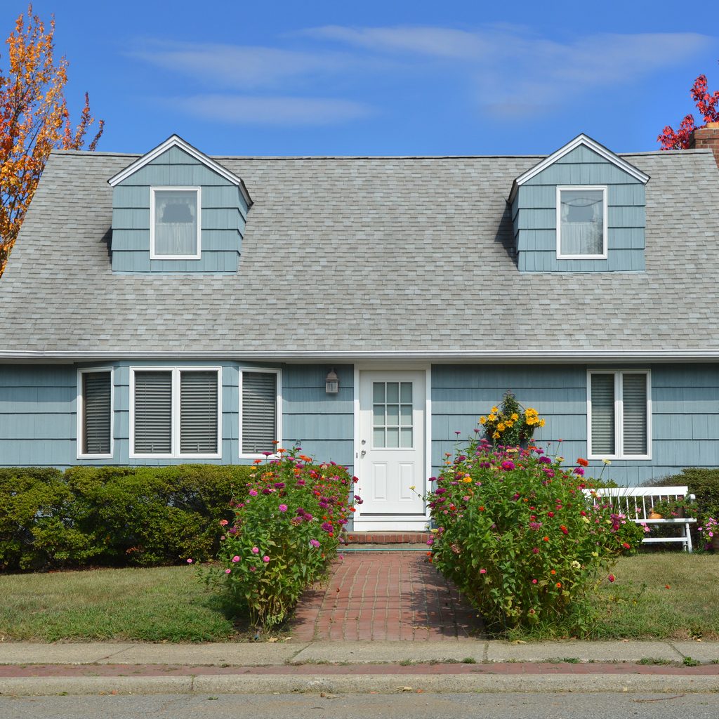 Blue cape cod house