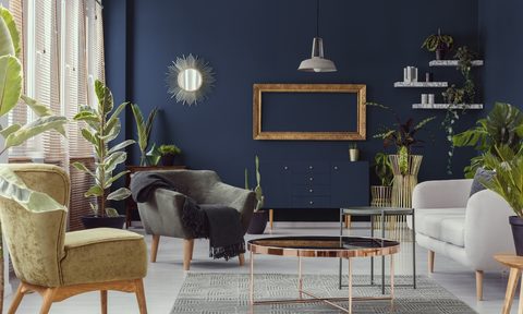 dark blue modern room with bronze metal decor