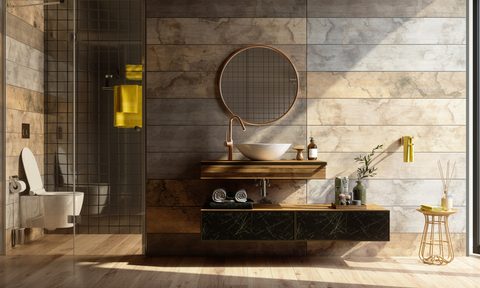 Luxury bathroom Interior with shower, toilet, mirror, and yellow towels