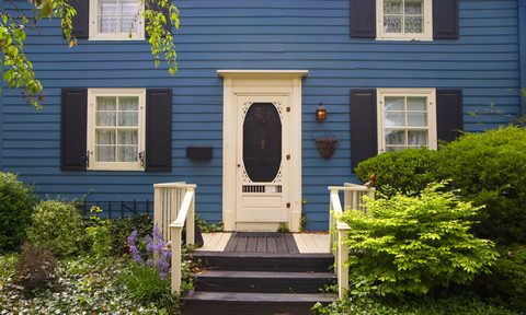 Deep blue house with two floors