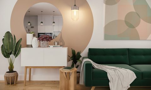 Neutral and green color palette for living room design