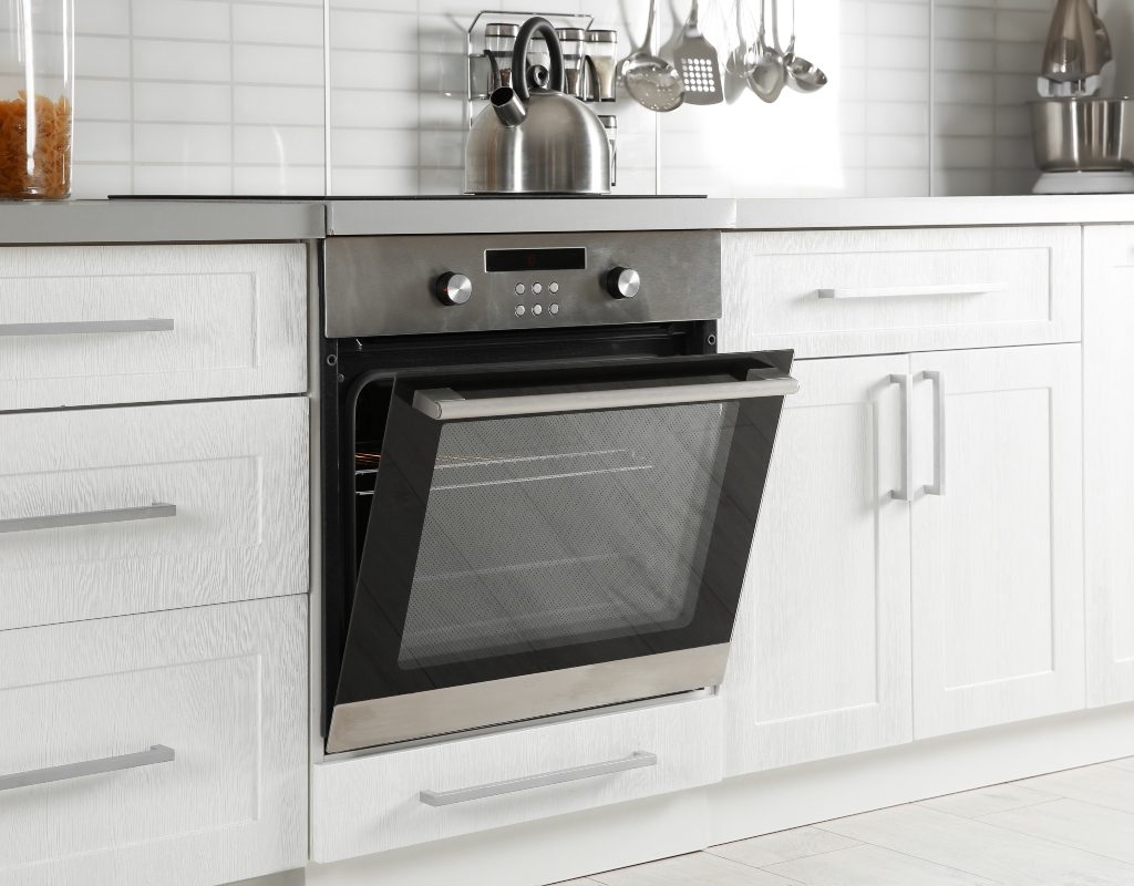 open oven door on silver stove