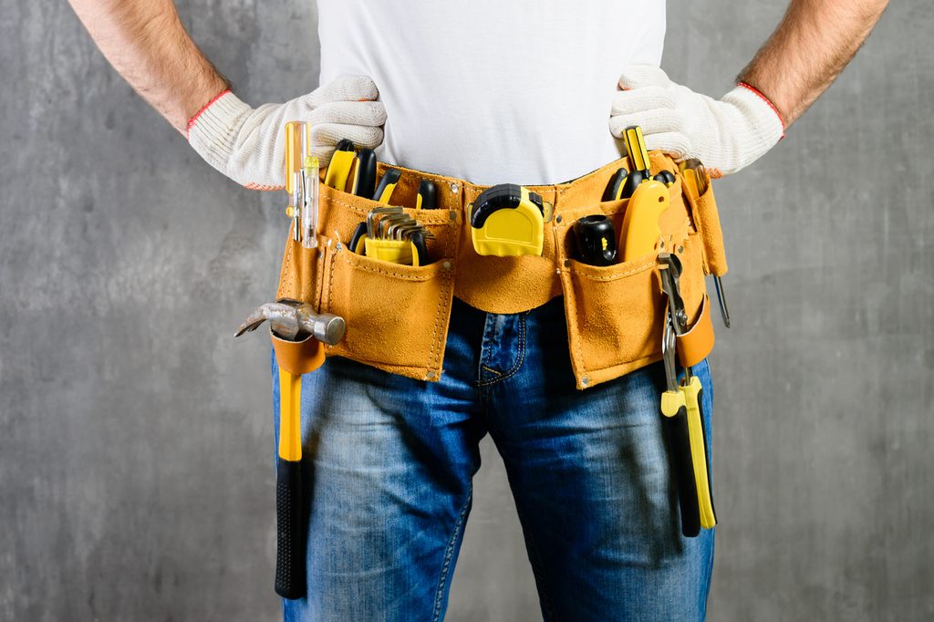 handyman with a yellow tool belt