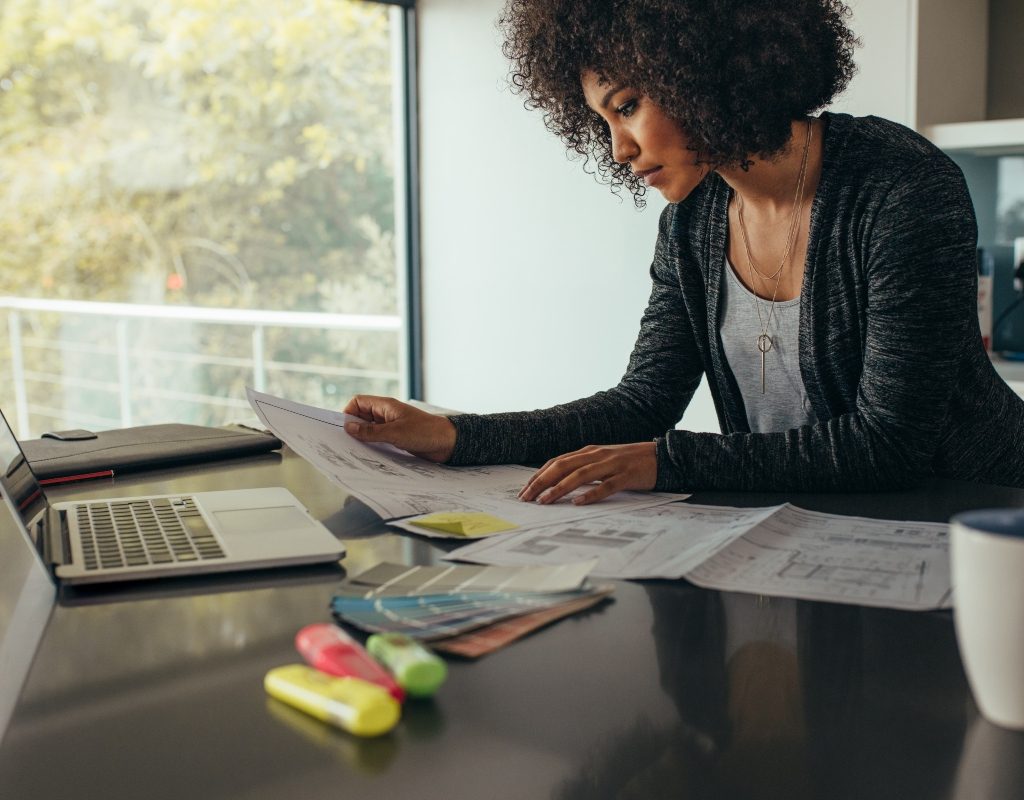 woman sitting at desk in a work from home office