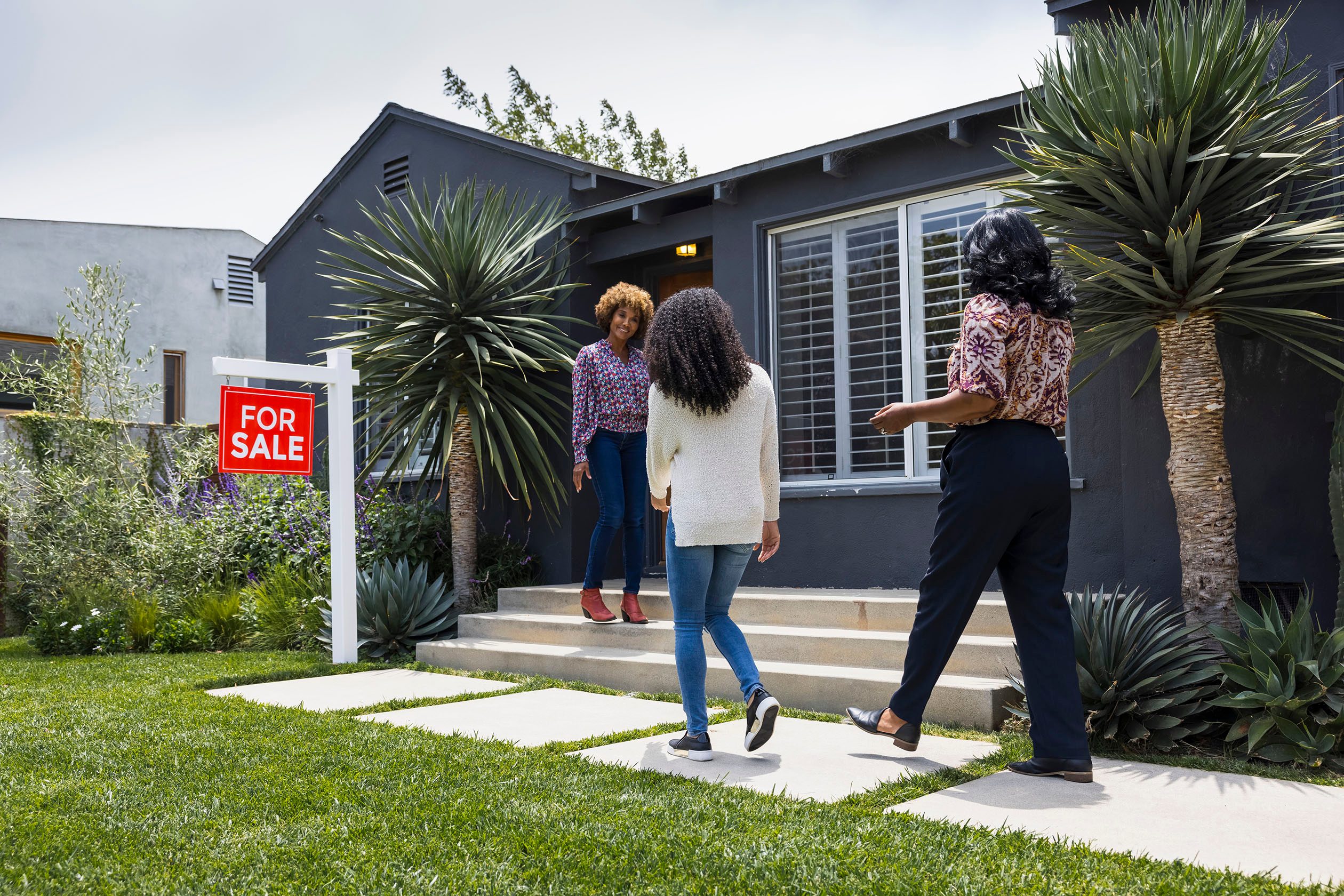 Women viewing a house that's for sale