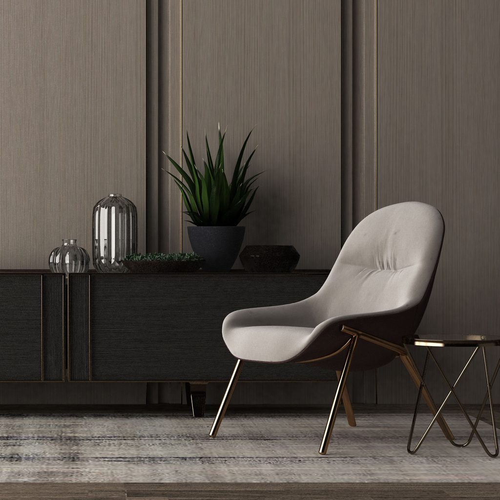 Chair and table next to black sideboard