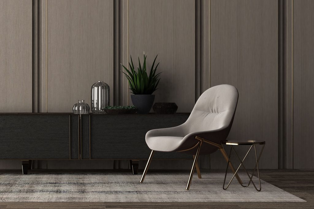 Chair and table next to black sideboard