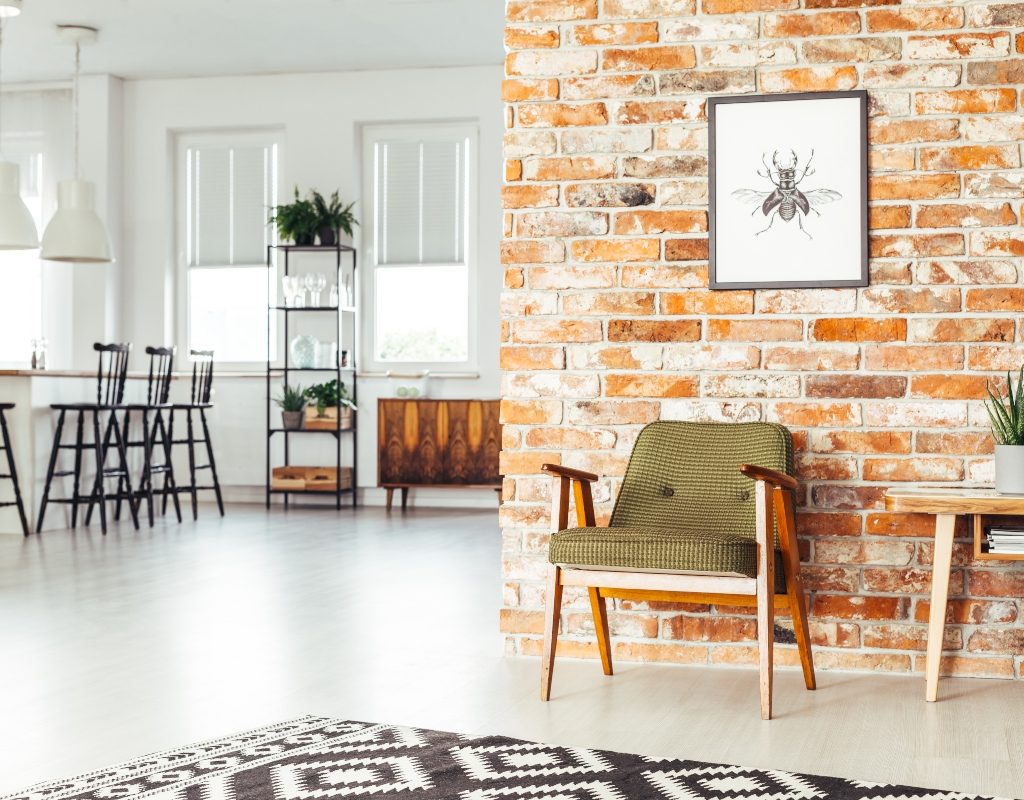light modern room with exposed red brick wall