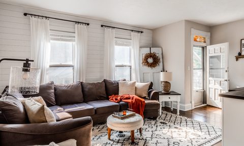 modern farmhouse aesthetic with dark colors and vintage touches