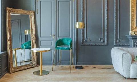 Modern regencycore aesthetic with blue walls and ornate mirror