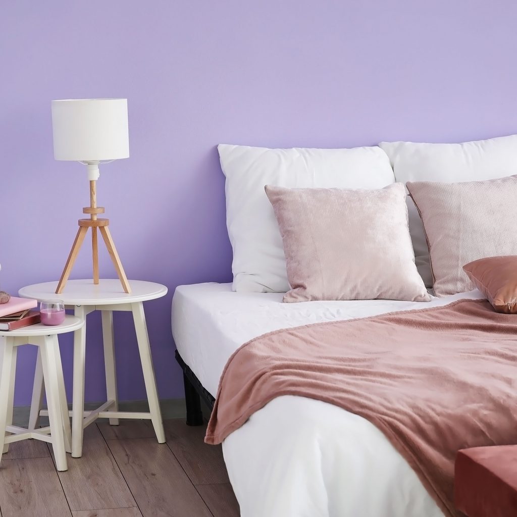 Purple bedroom with dusty pink bedding