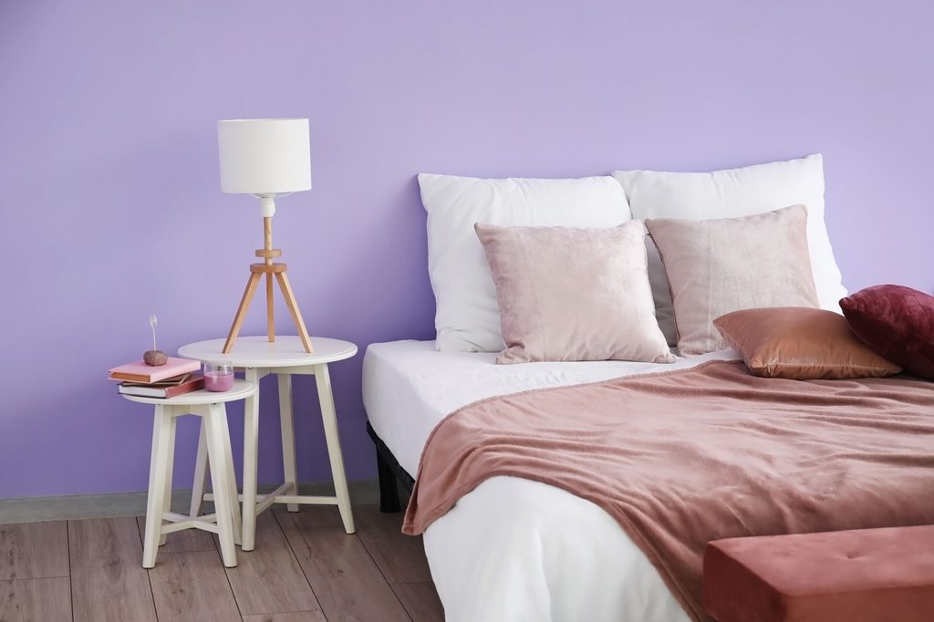 Purple bedroom with dusty pink bedding
