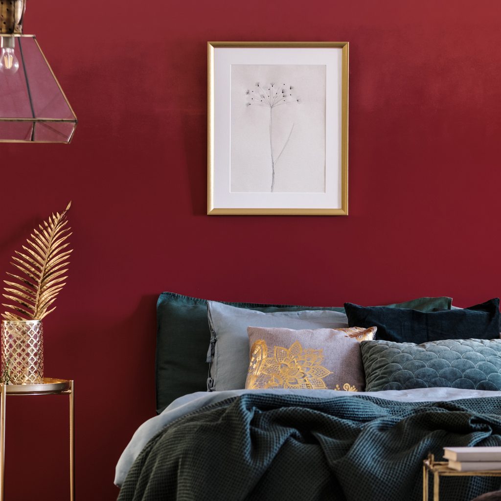 Deep red bedroom wall design