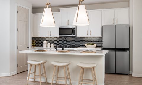 Updated kitchen with tile backsplash