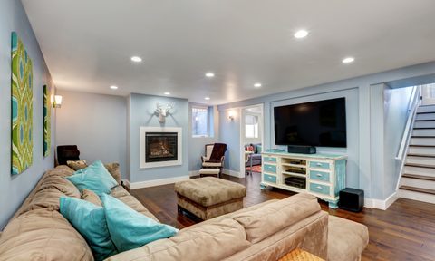 Basement with blue walls.