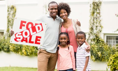 Family happy after buying a home