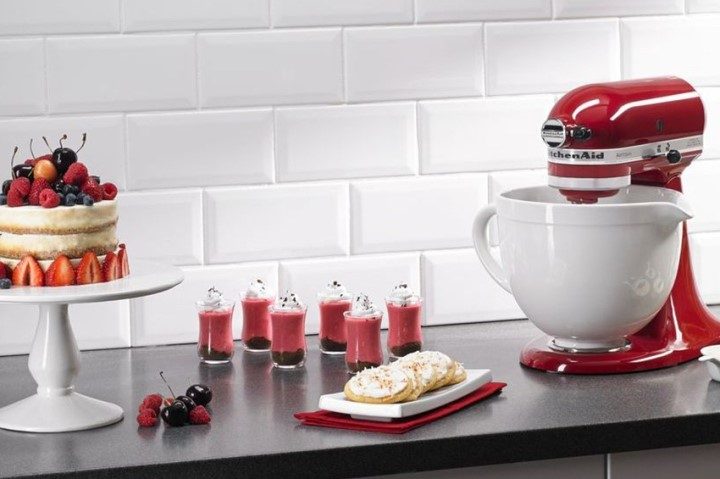 KitchenAid stand mixer next to a variety of aesthetic desserts