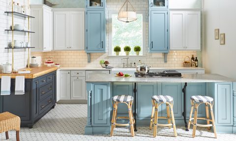 Kitchen with light blue cabinets and wood accents