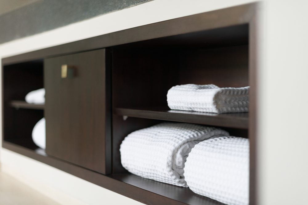 Bathroom shelves with towels