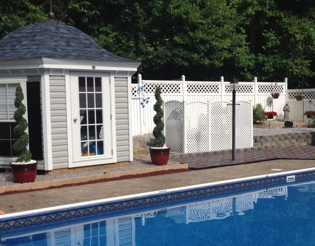 Backyard with swimming pool and pool house