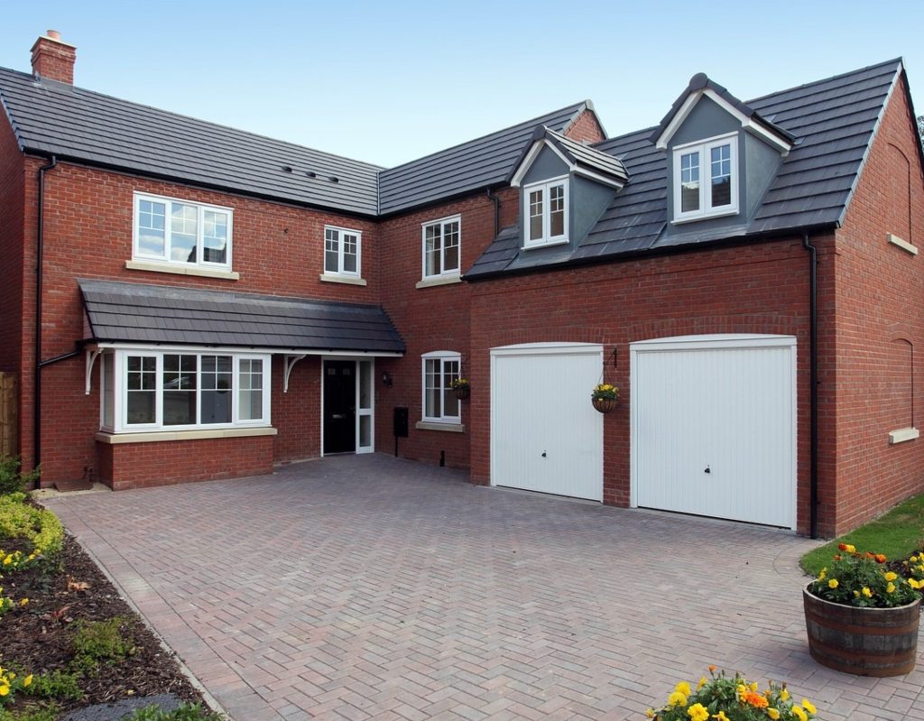 Brick house with brick paver driveway