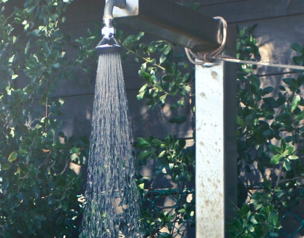 Outdoor rain shower head with plants