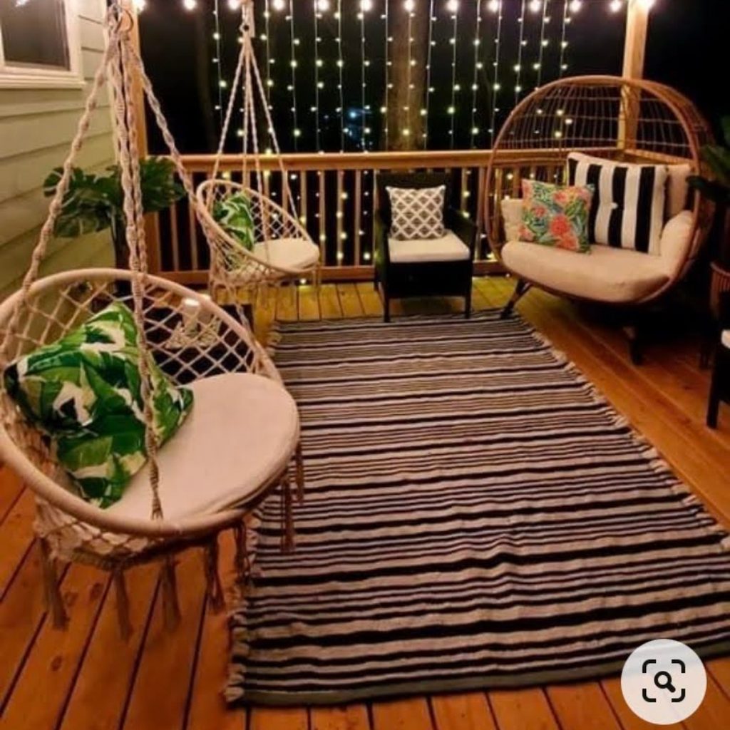 Chair swings on a small covered outdoor patio