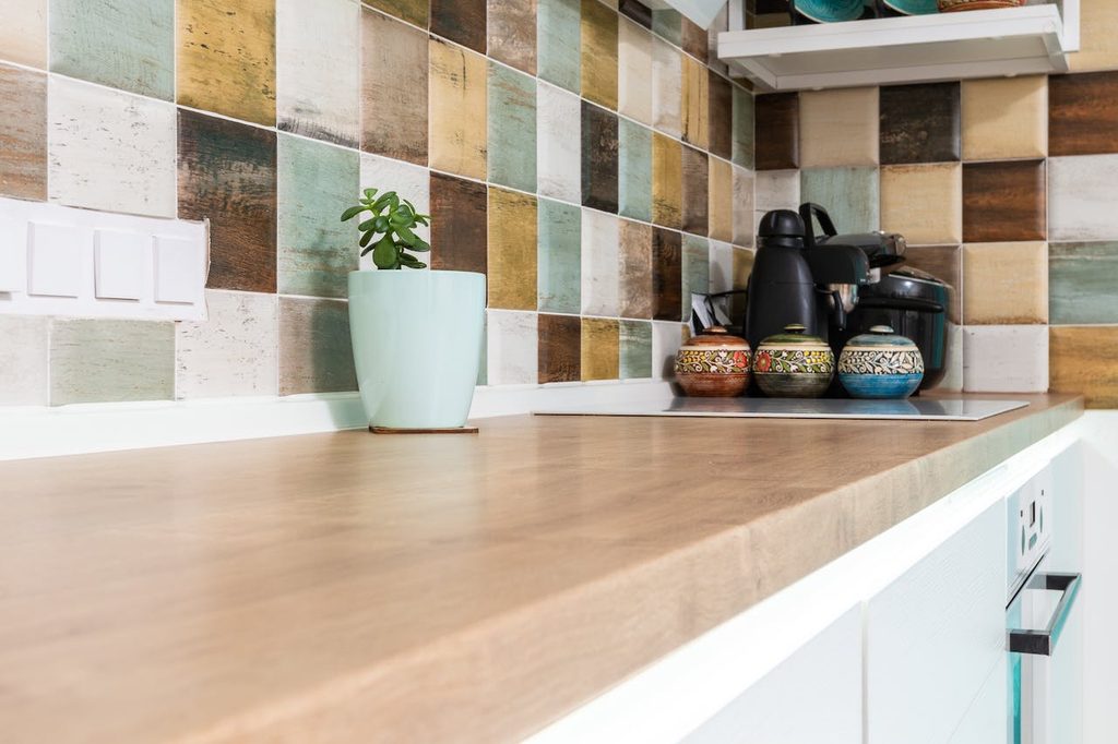 brown, tan, and white textured kitchen backsplash tile