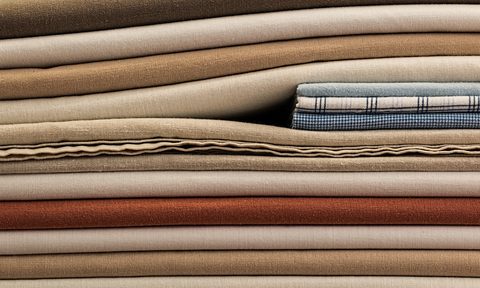 Neatly folded and stacked linens