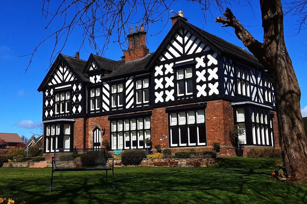 tudor style house with black and white half-timbering