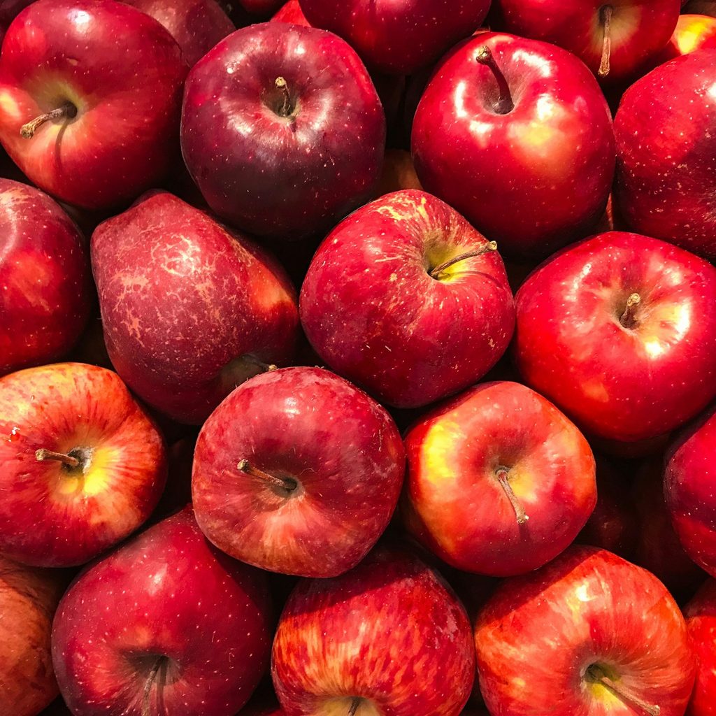 Red apples in a pile