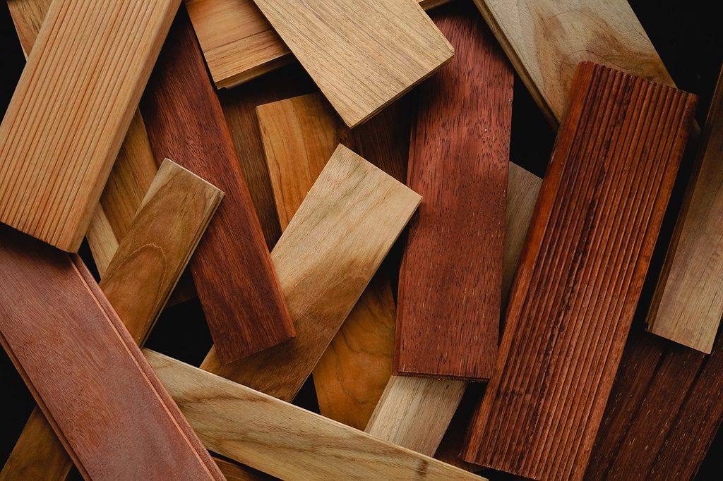 pieces of wood flooring panels in a pile