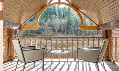 Covered balcony deck made of wood with shiplap ceiling