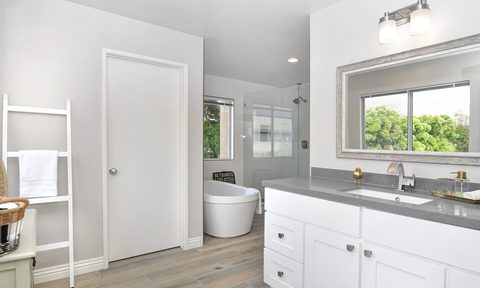 A clean, modern bathroom with a soaking tub