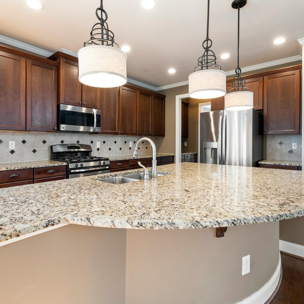 Granite countertop on kitchen island in traditional design