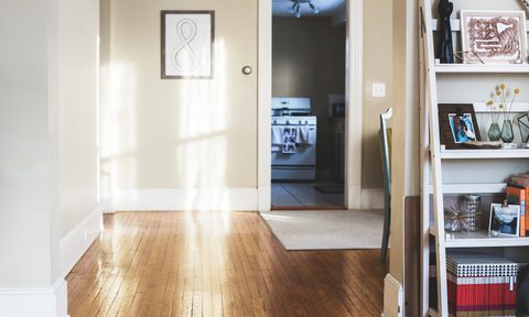 Clean space with beige walls and white baseboards