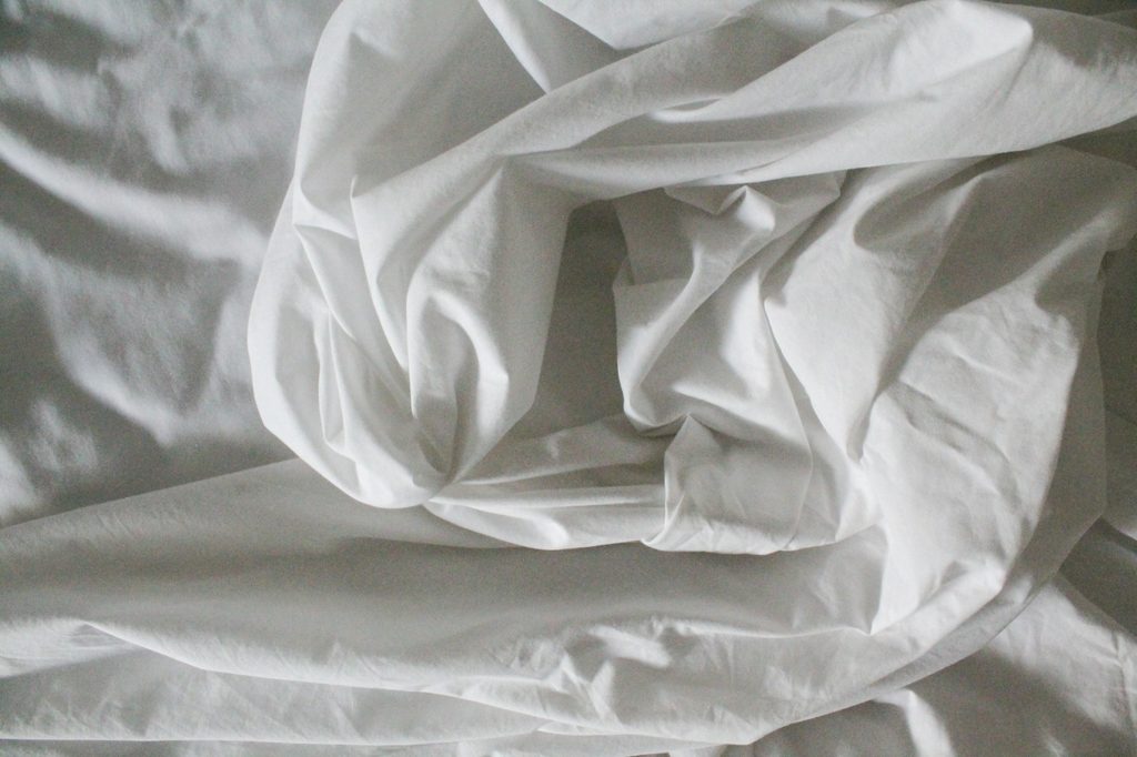 Crumpled white sheets