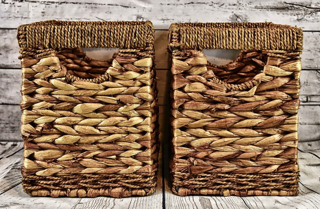 Two wicker baskets with covers